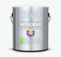 Shiny silver can of Valspar Reserve Interior Paint and Primer. Can features colorful “Color Stays True” shield.